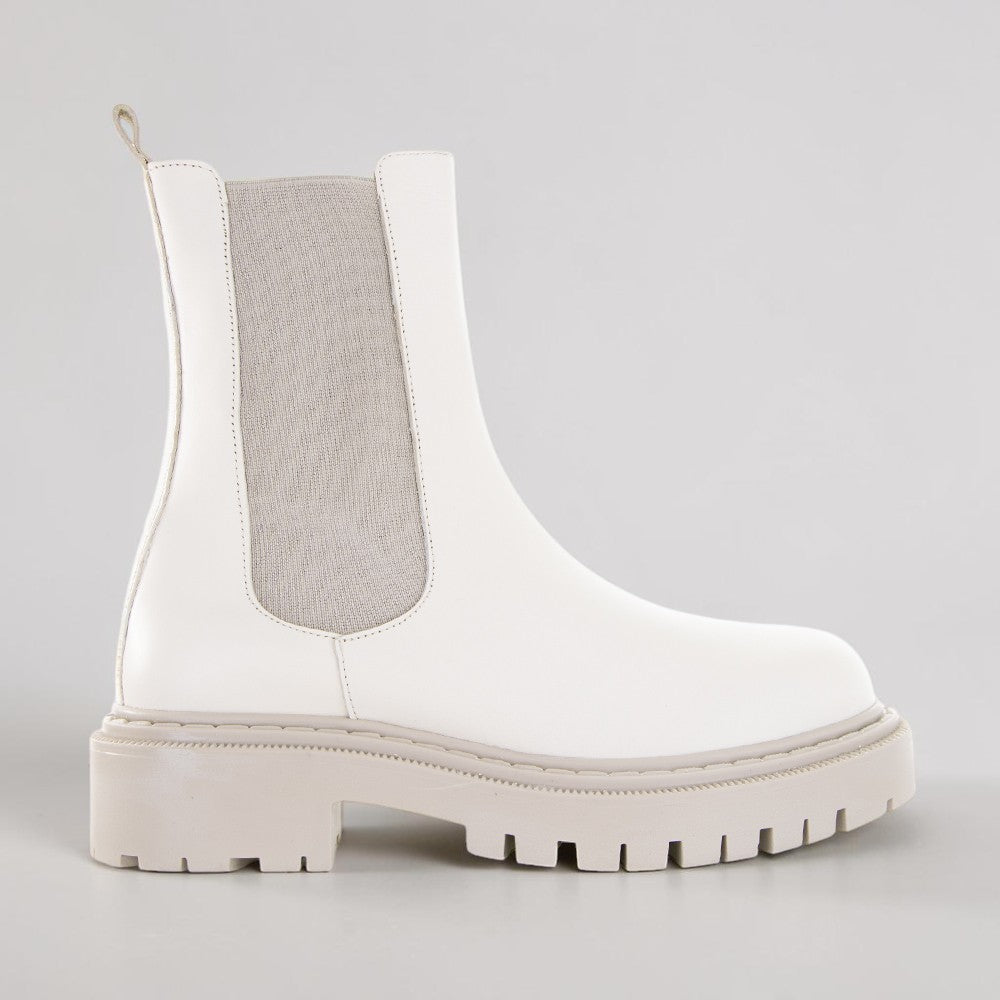 LE SANSA Rebecca Vanilla boots featuring sleek design and neutral color, perfect for stylish fall and winter outfits.