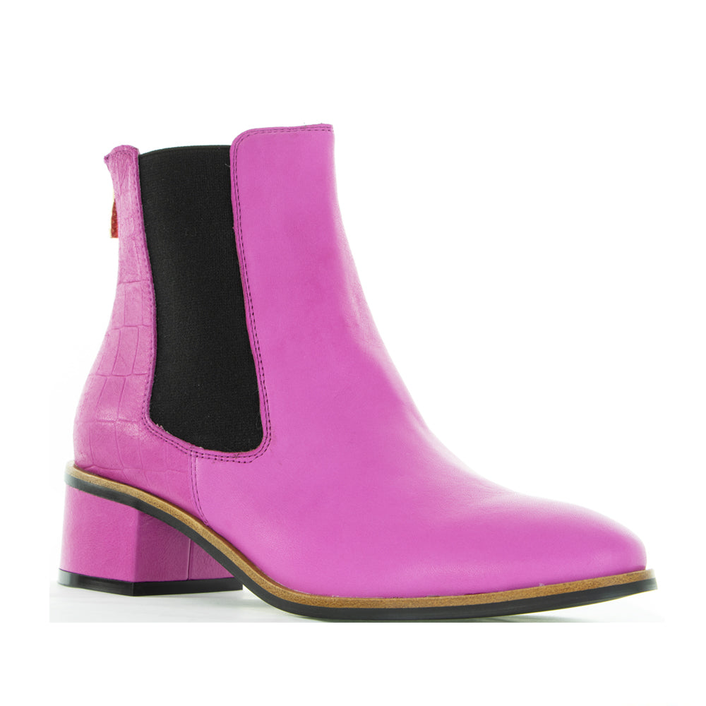 Le Sansa Remton hot pink boots featuring a stylish design and sleek finish, perfect for trendy winter or casual wear.