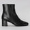Black LE SANSA Rocket boots shown from the side, featuring sleek design and sturdy sole, ideal for casual or outdoor wear.