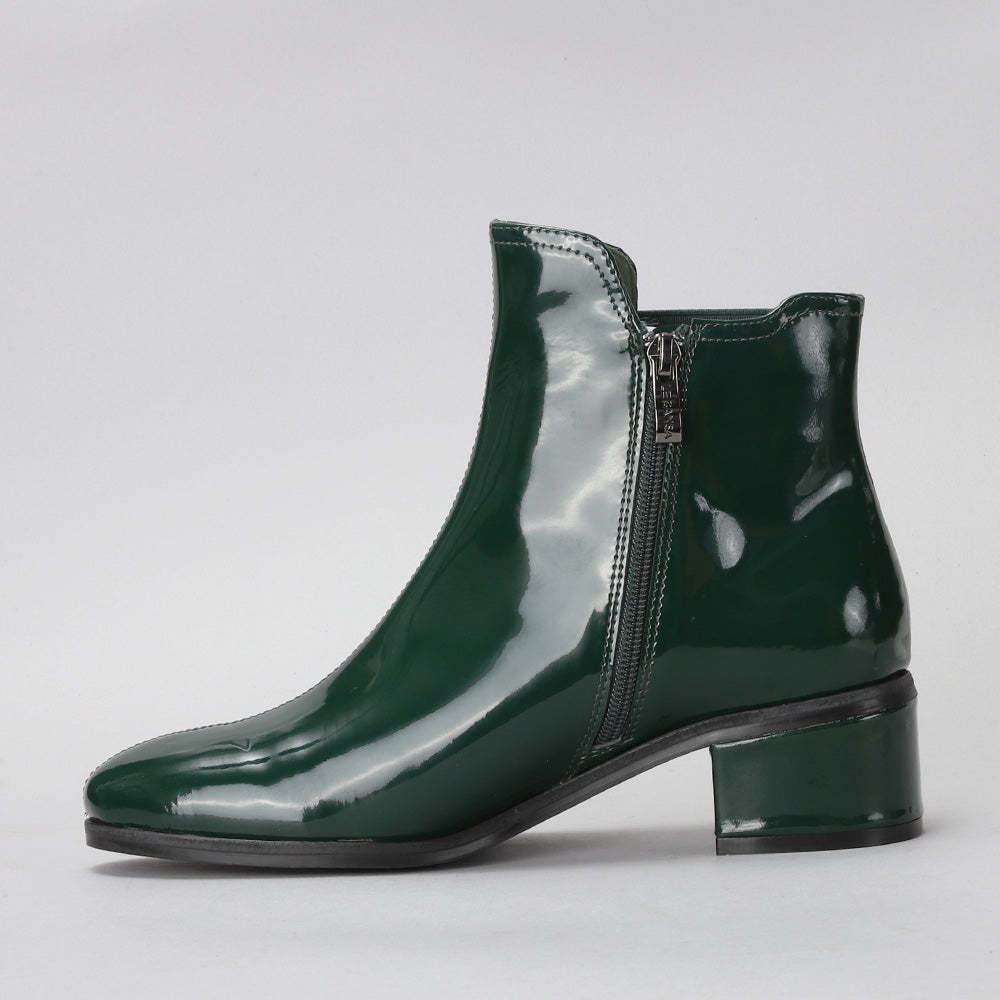 Le Sansa Romy green bottle boots, stylish and durable footwear with a sleek green design, perfect for casual wear.