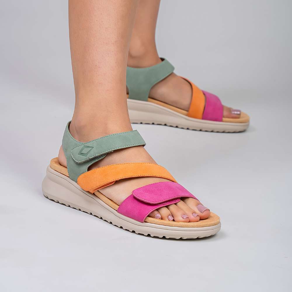 CC Resorts Pershing sandals in fuchsia, tan, and sage with strappy design and comfortable flat sole.