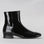 LE SANSA Sasha black patent boots with side zipper, stylish and glossy footwear for elegant or casual outfits.