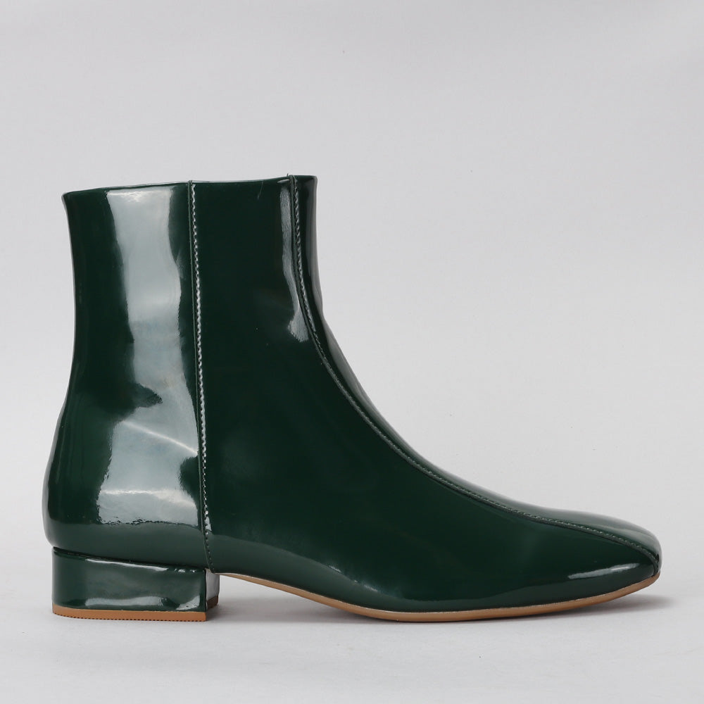 Green leather ankle boots by Le Sansa, style Sasha, featuring side zipper and sleek design.