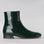 Green LE SANSA Sasha bottle-shaped boots with patent finish, side view showcasing sleek design and glossy surface.