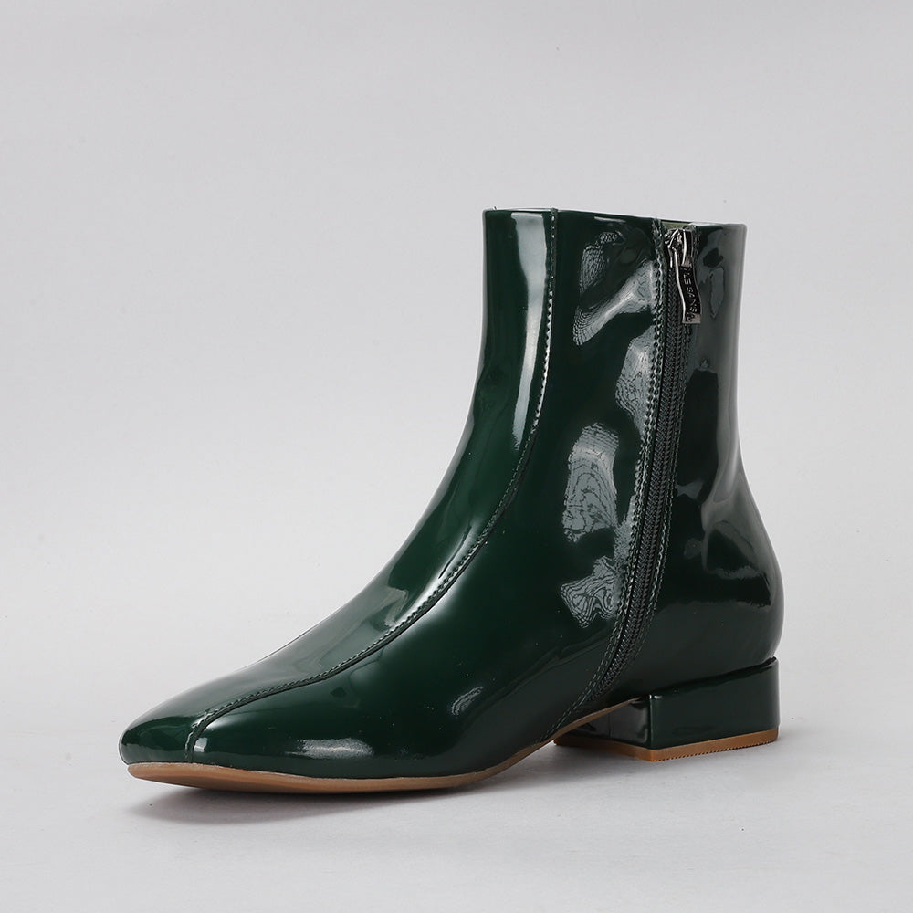 Le Sansa Sasha green bottle boots with southwestern pattern, featuring vibrant green color and stylish design.