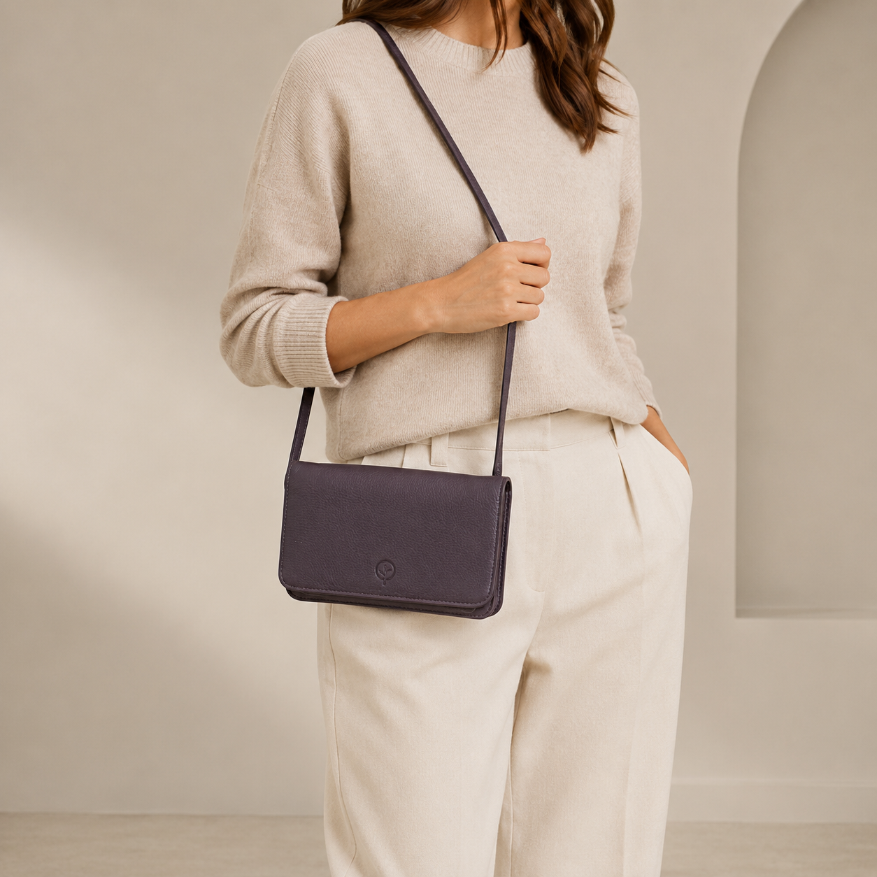 Second Nature navy handbag featuring a sleek design with top handles and subtle branding, perfect for everyday use.