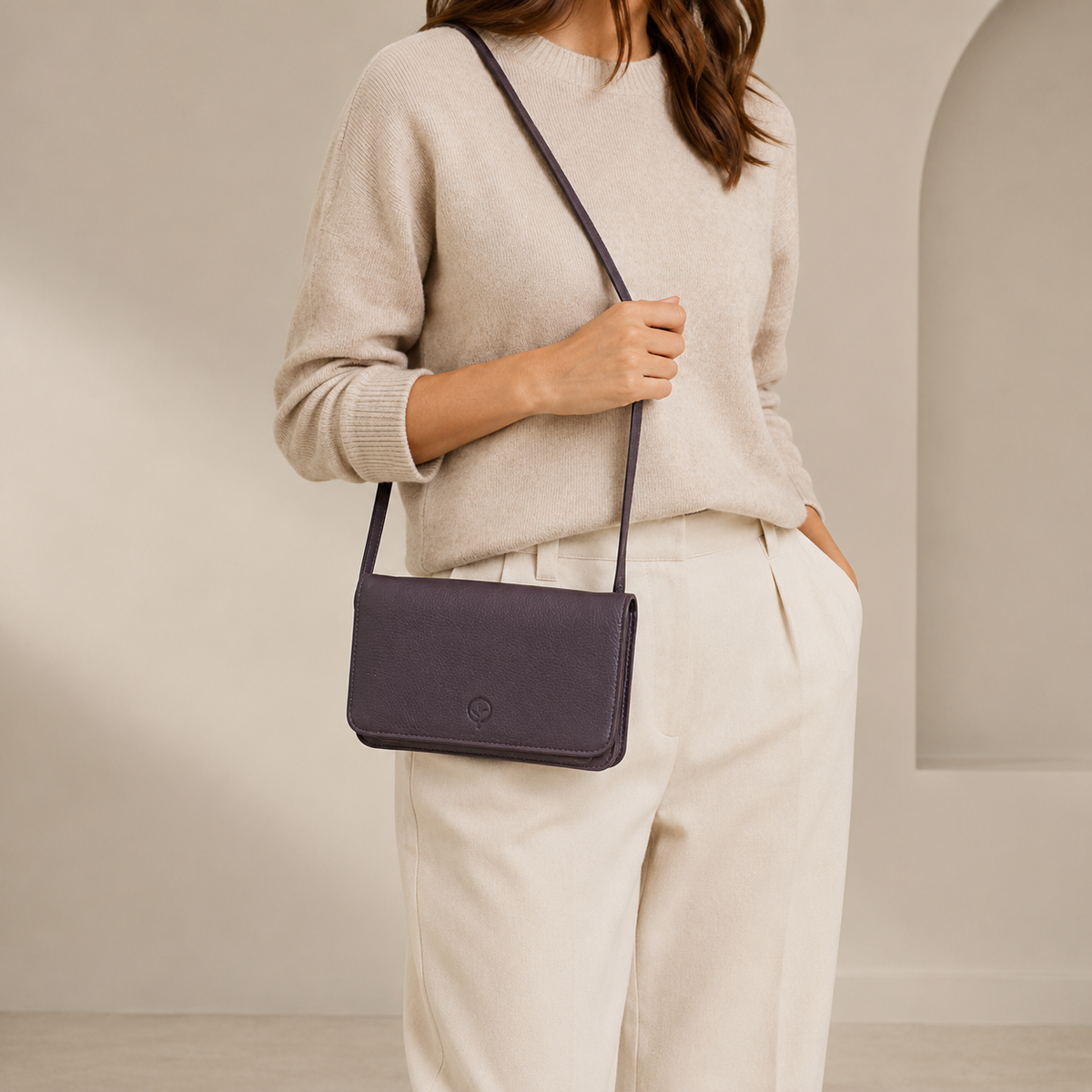 Second Nature navy handbag featuring a sleek design with top handles and subtle branding, perfect for everyday use.