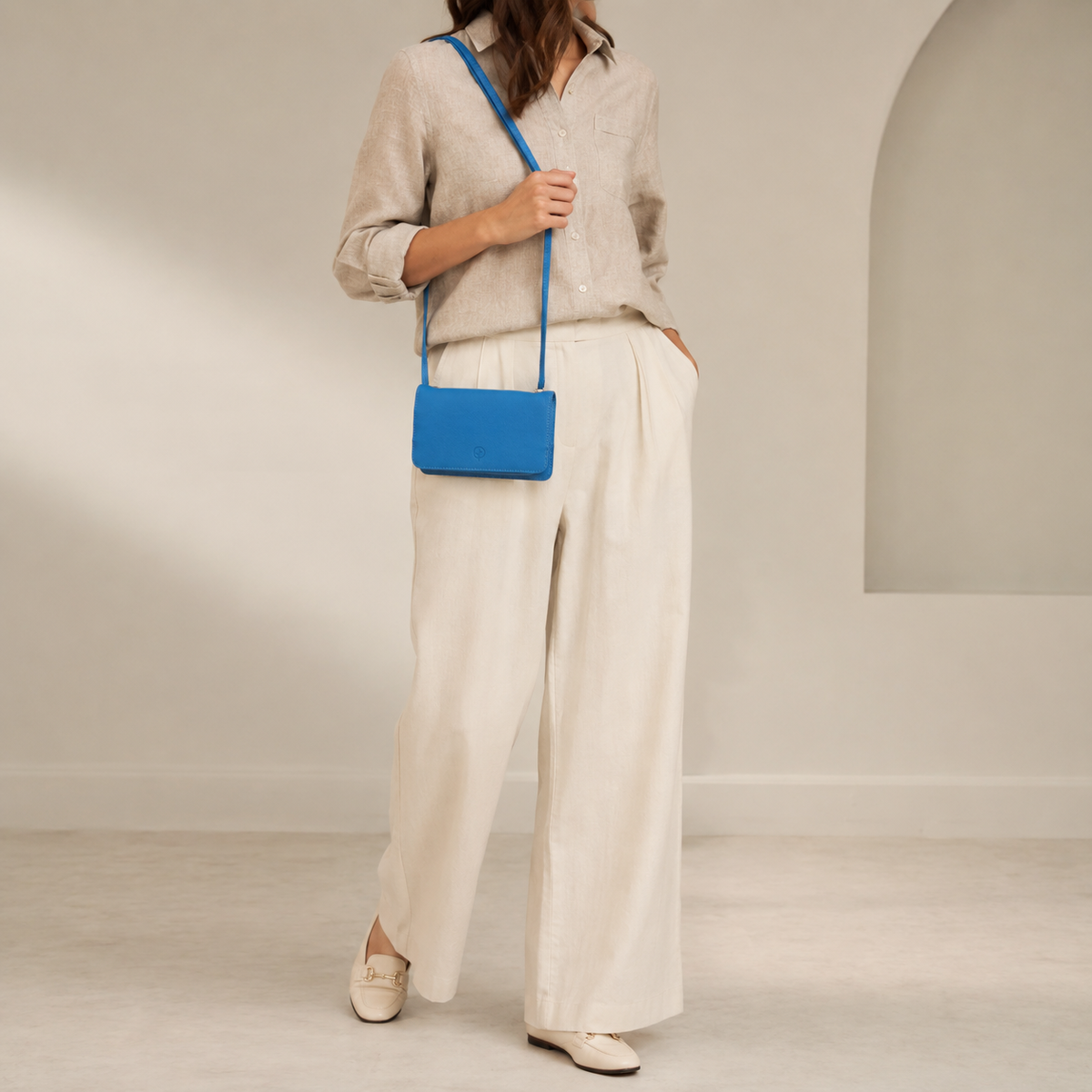 Second Nature CB4 Ocean handbag with textured leather in vibrant blue, featuring a sleek design and sturdy handles.