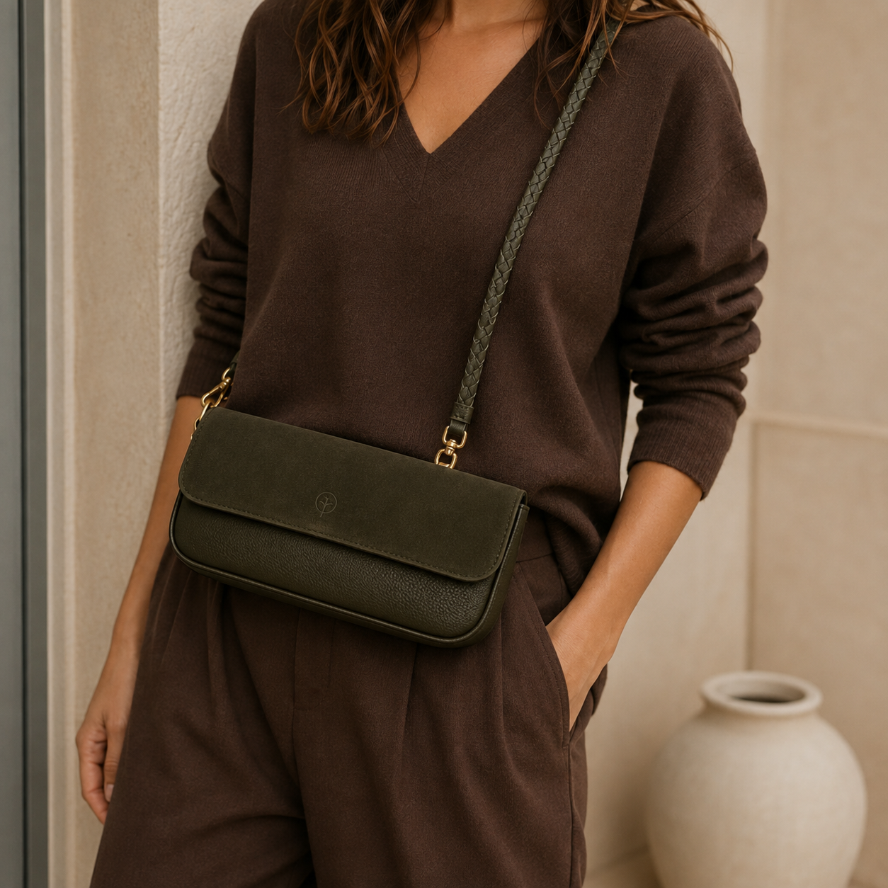 Second Nature olive green handbag with textured surface and structured design, featuring double handles and subtle branding.