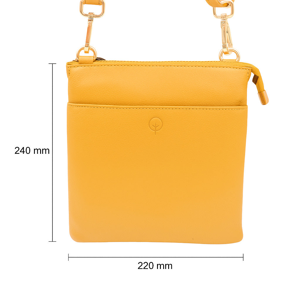 Second Nature saffron handbag with a sleek design, featuring a structured shape and elegant handles.