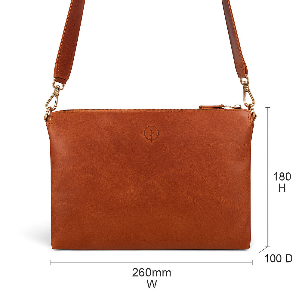 Tan Second Nature handbag with sleek design and sturdy handles, showcasing the stylish and functional handbag in natural light.