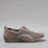 CC Resorts Sorrell taupe casual shoes with side view showing smooth leather and versatile design.