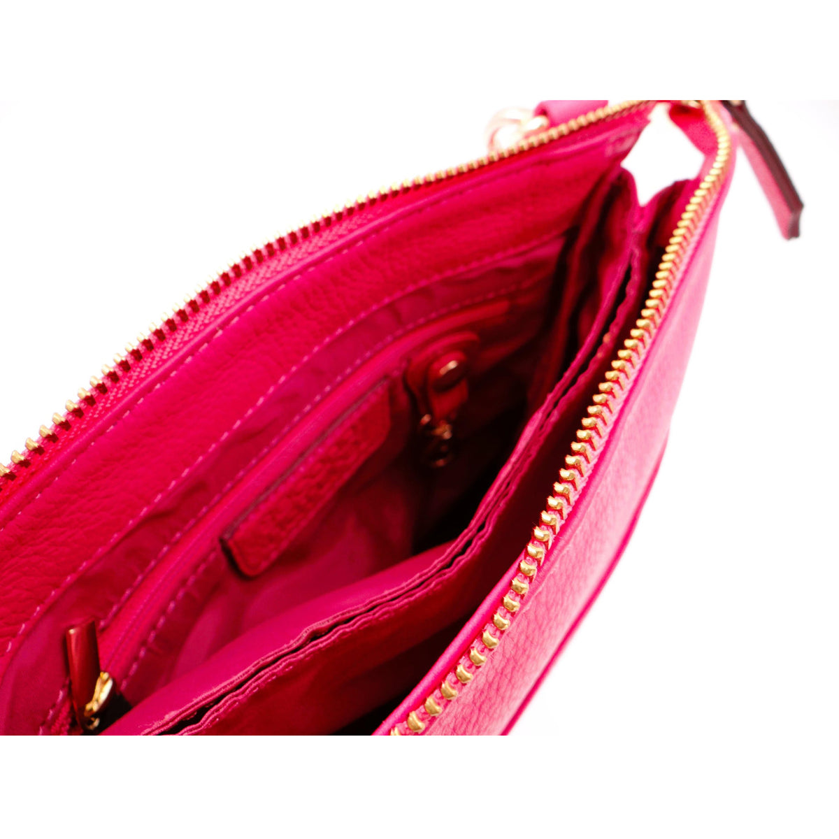 Second Nature Second Nature ST31 fuchsia handbag with sleek design and sturdy handles, vibrant color, and textured finish.