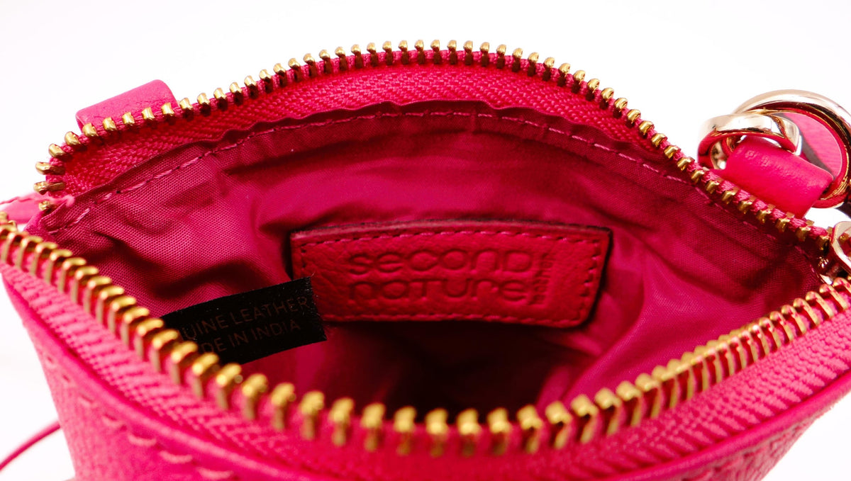Second Nature Fuchsia handbag with sleek design, featuring a vibrant fuchsia color and stylish handles.