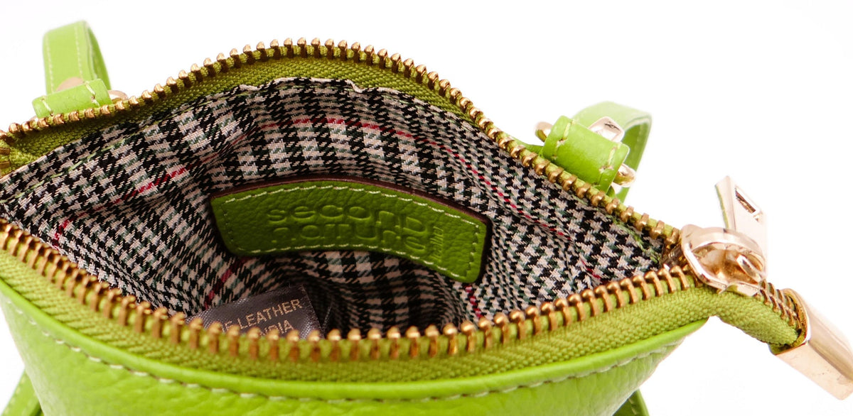 Second Nature ST57 Lime handbag with a sleek design and vibrant lime green color, shown from a front view.