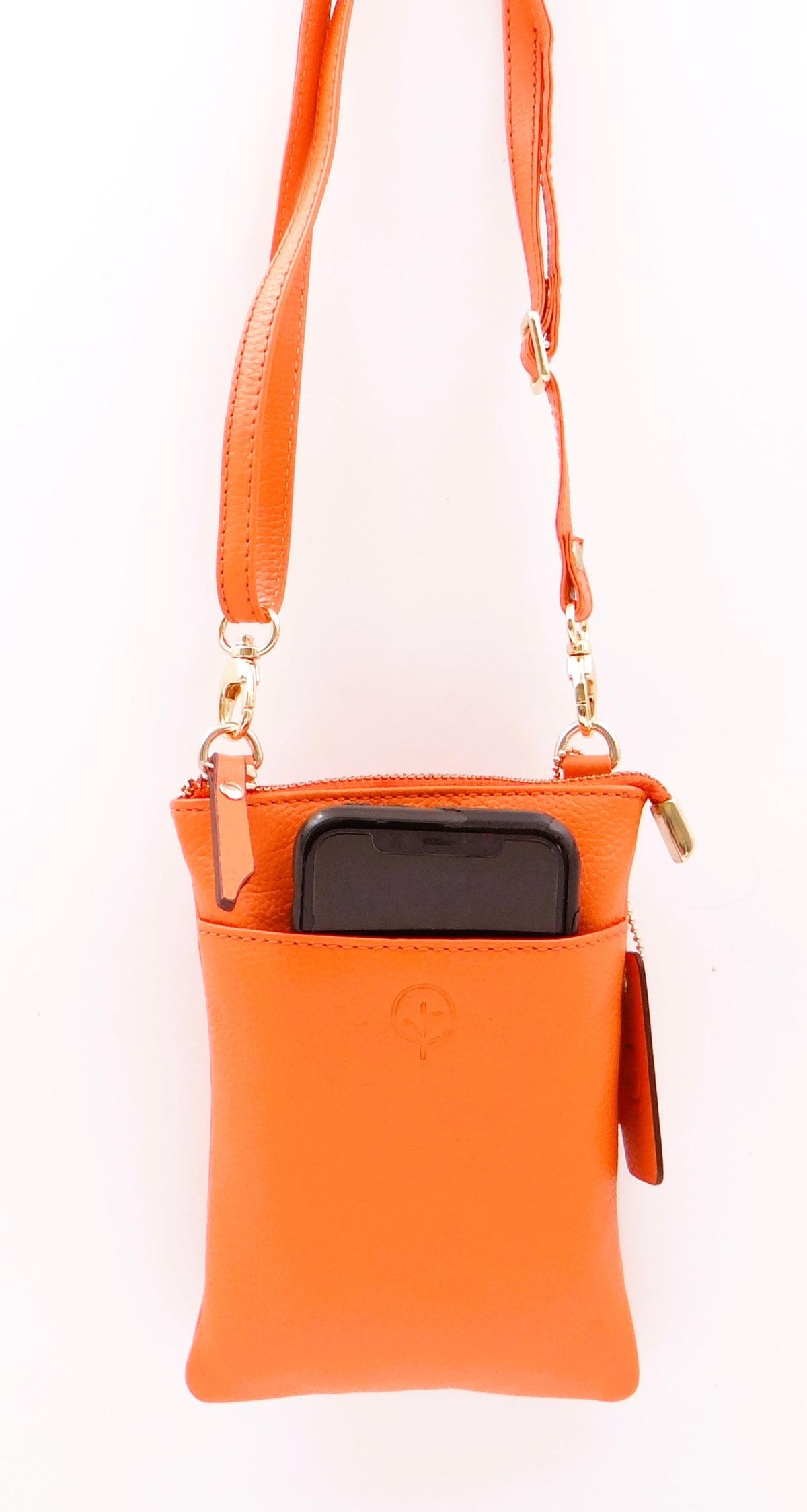 Second Nature Second Nature ST57 orange handbag with stylish design, featuring textured leather and a sleek, modern shape.