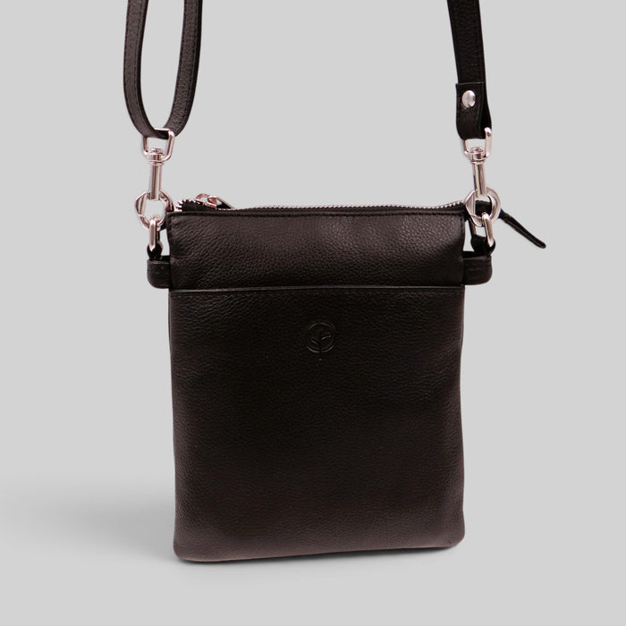 Black Second Nature HANDGAGS model ST64 with sleek design and minimal detailing, shown on a plain background.
