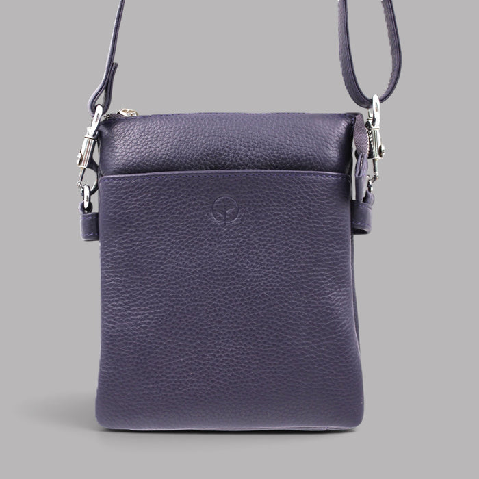 Second Nature navy handbag with structured design and top handles, featuring a sleek, modern look.