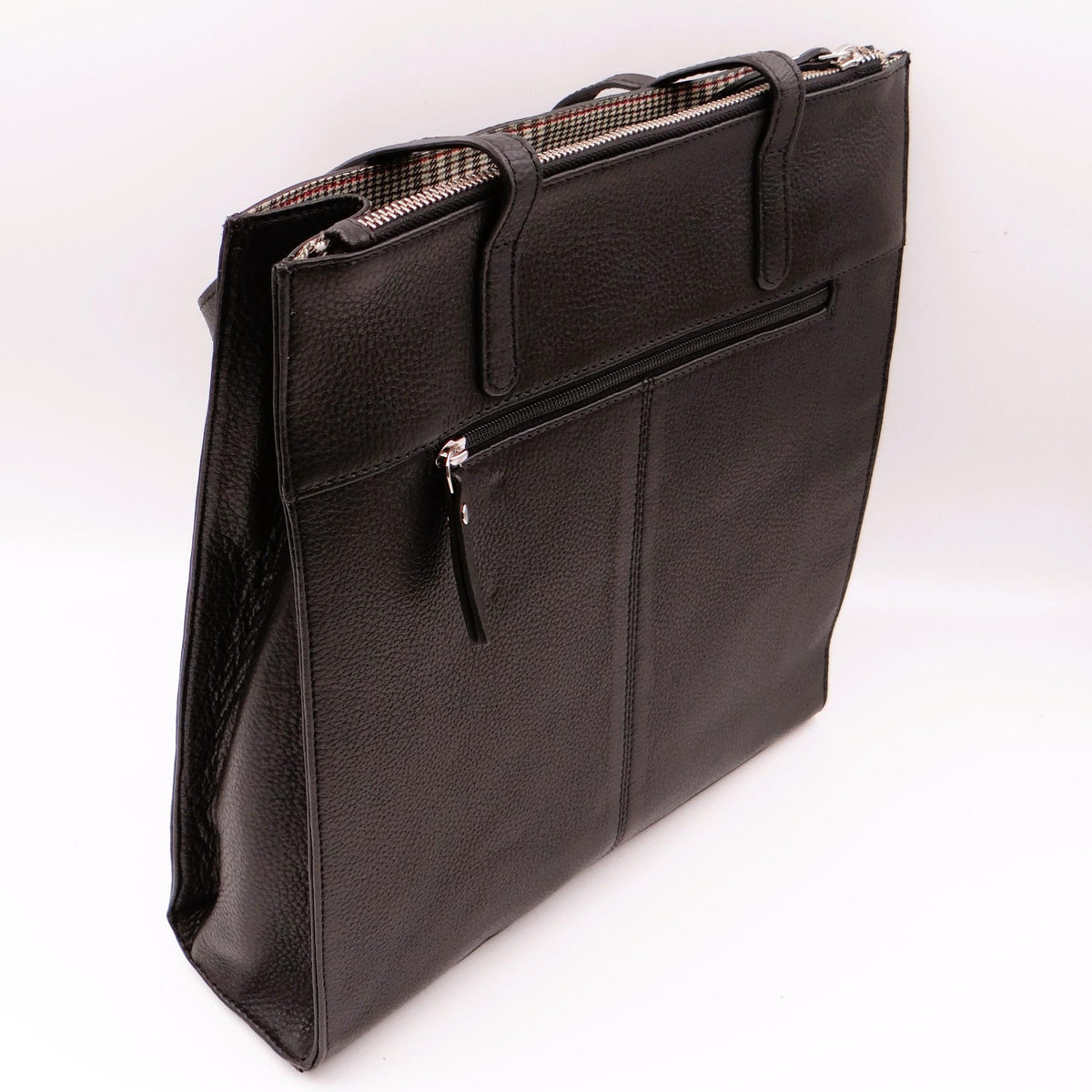 Black Second Nature Handbag with sleek design and top handles, featuring subtle branding and stylish detailing.
