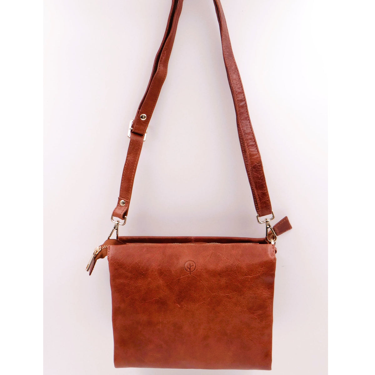 Second Nature ST82 Tan handbag showing a stylish leather tote with dual handles and subtle branding.