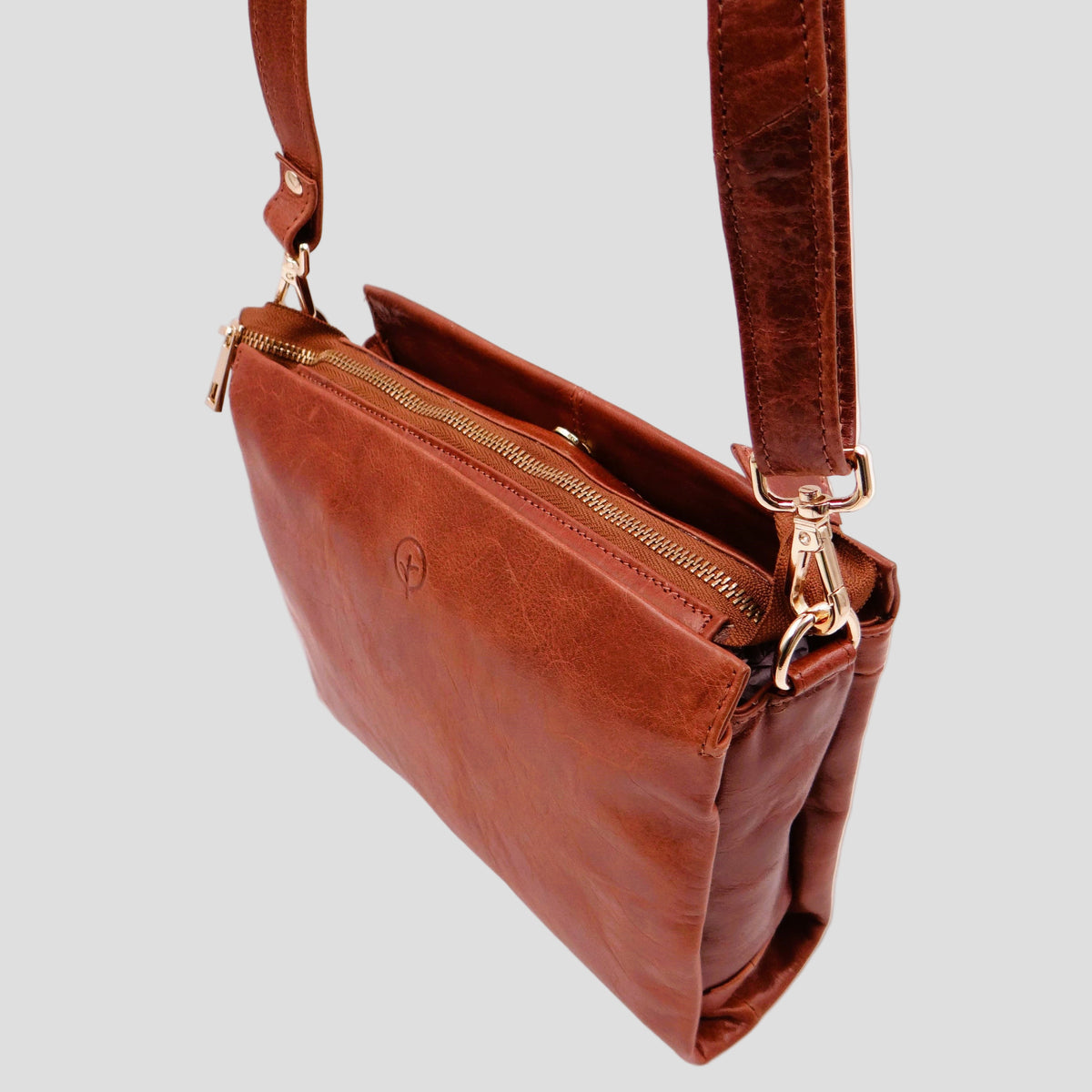 Second Nature tan handbag with sleek design, featuring handles and detailed stitching, perfect for stylish everyday use.