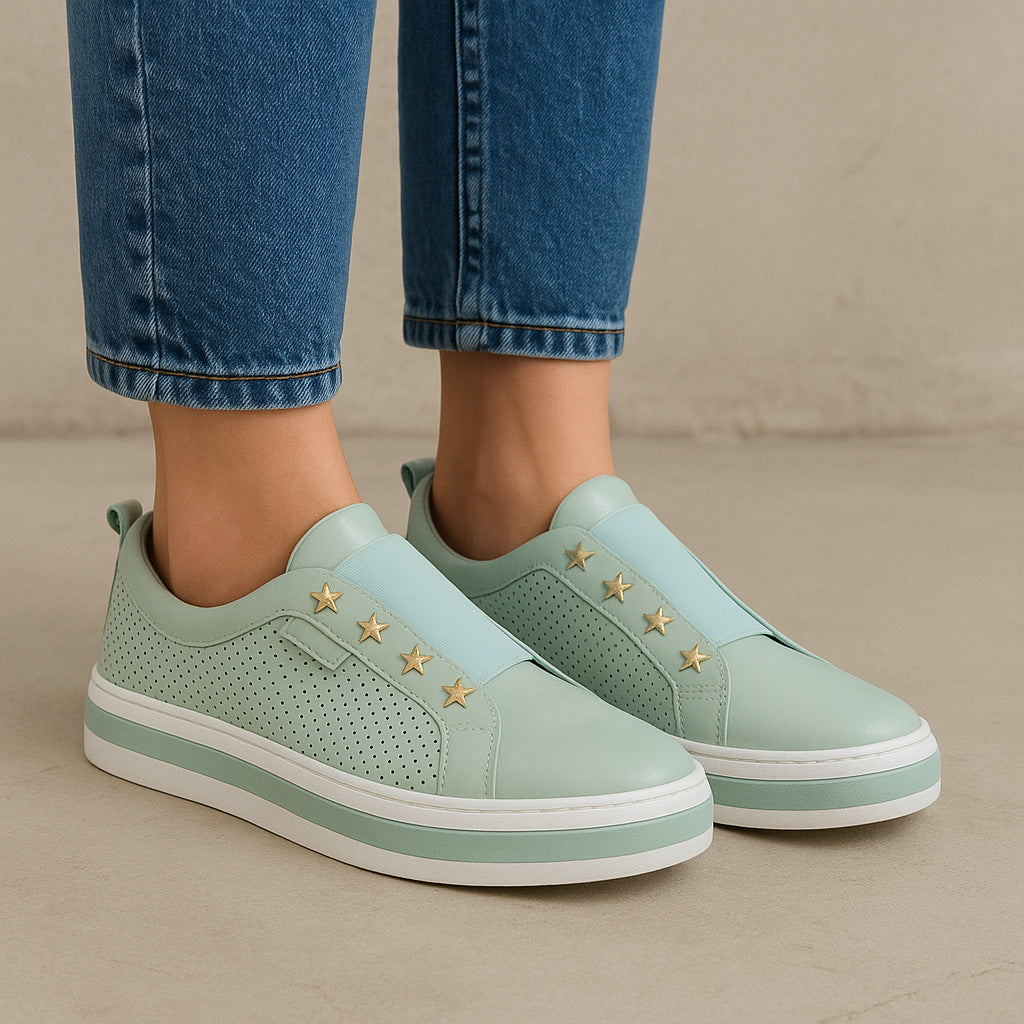 Le Sansa Lesansa Stark Mint slip-on shoes with a sleek design and mint green color, perfect for casual wear.