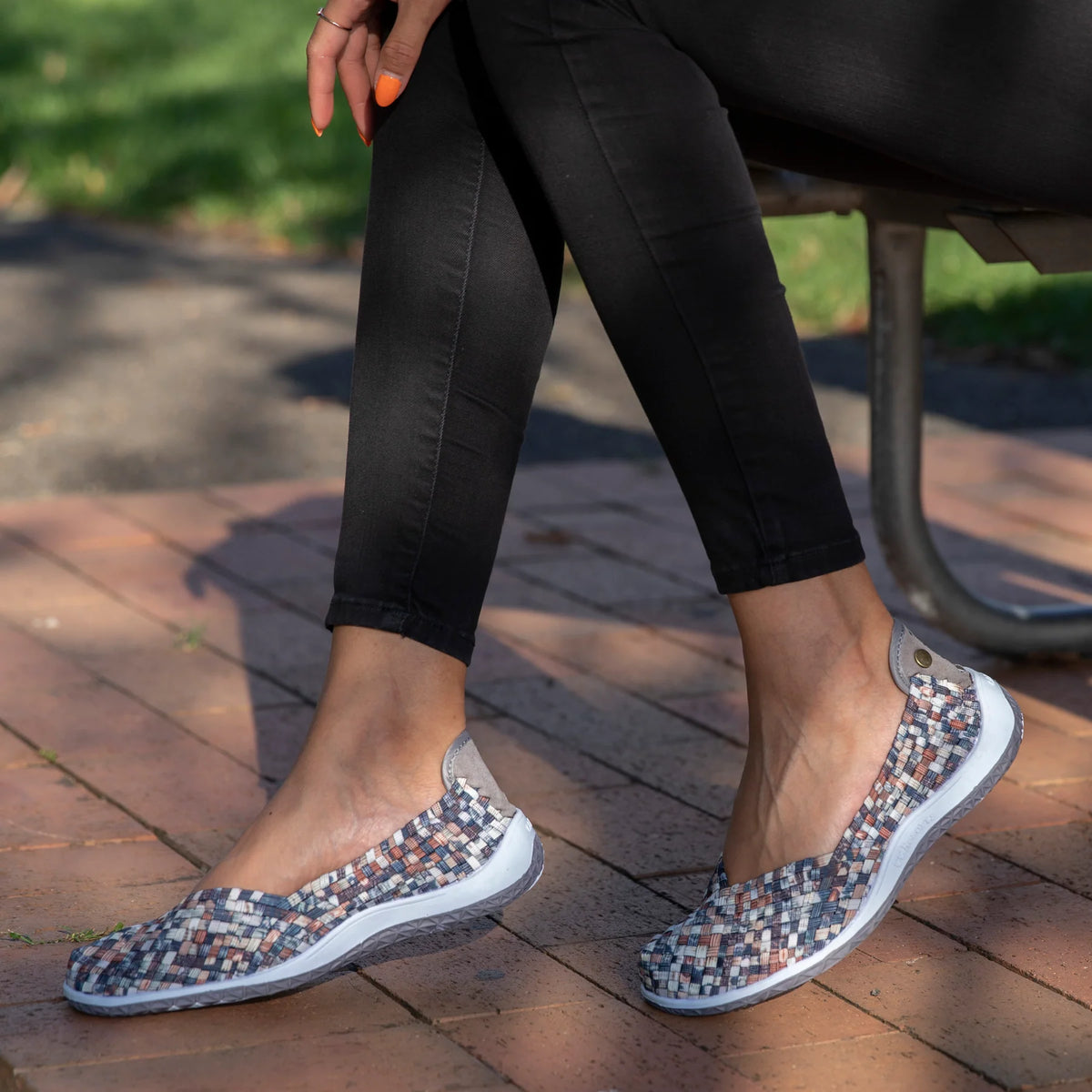 CC Resorts Sugar Brown Multi flats with woven strap design and colorful pattern, showcasing the stylish and comfortable footwear.