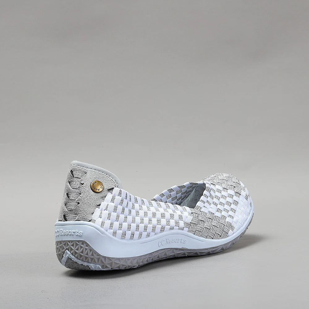 CC Resorts Sugar White Silver flats with sleek design and silver finish, perfect for casual or dressy occasions.