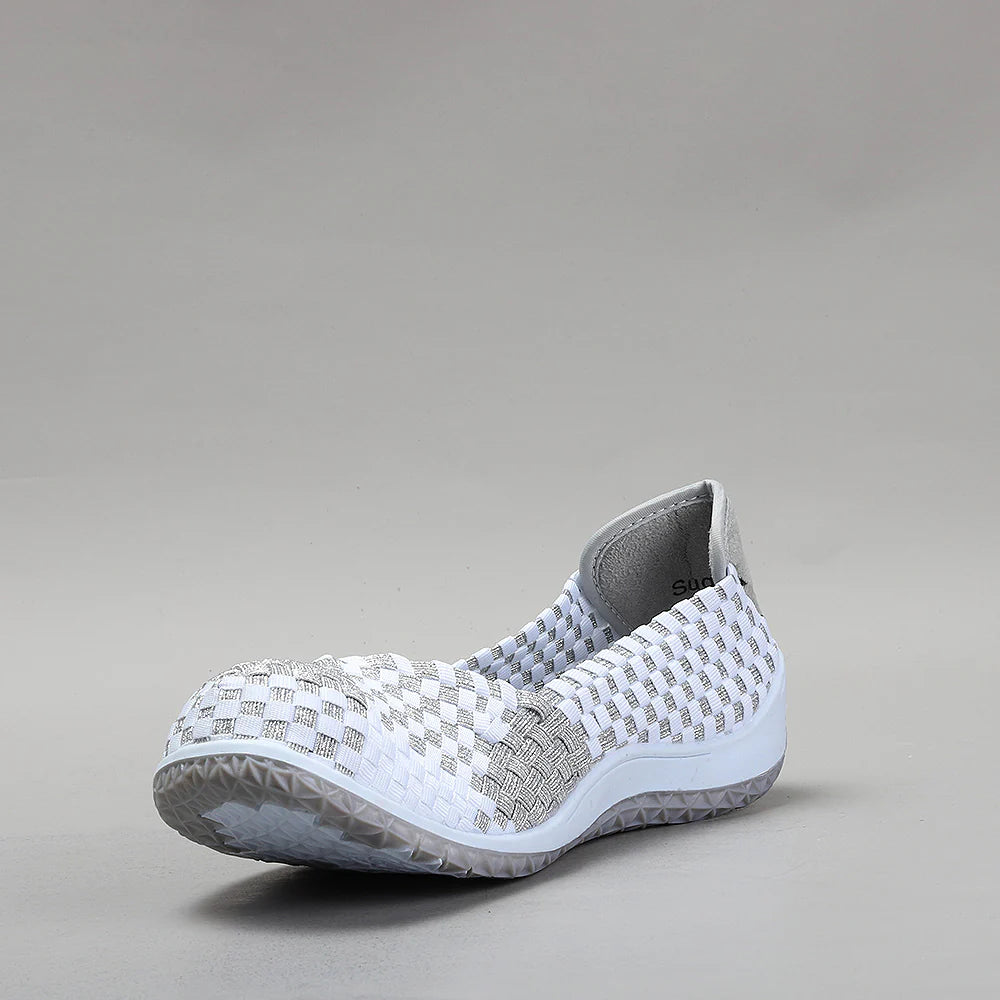 CC Resorts Sugar White Silver flats featuring a sleek design and metallic finish, perfect for casual or dressy occasions.