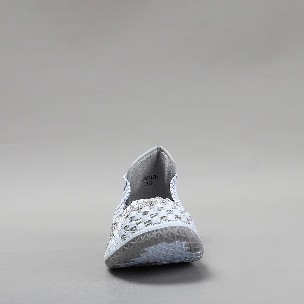 CC Resorts Sugar White Silver flats featuring a sleek, elegant design with silver accents and comfortable slip-on style.