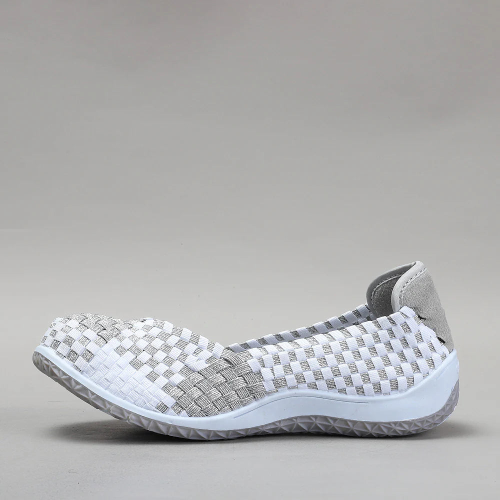 CC Resorts Sugar White Silver flats with sleek design and silver finish, perfect for casual or dressy occasions.