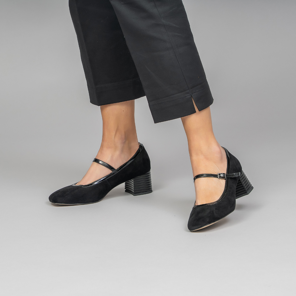Black LE SANSA ZAFIRA heels by Le Sansa with pointed toes and stiletto heels, displayed on a neutral background.