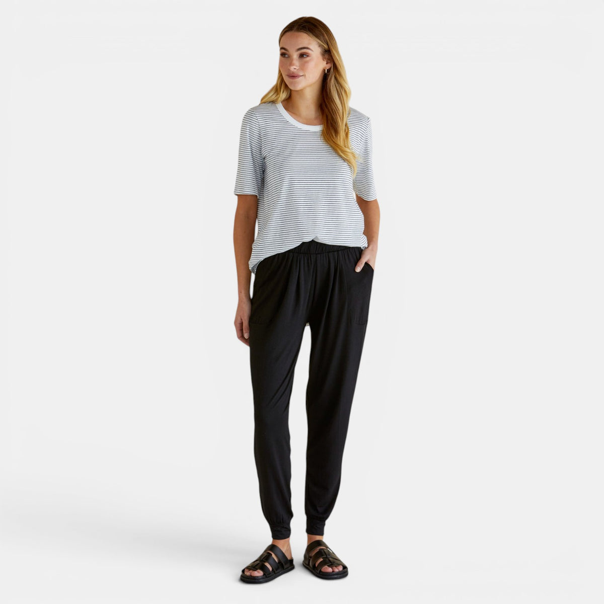 Black Betty Basics Paris Jogger Pant shown on a model, featuring a relaxed fit and elastic waistband, perfect for casual wear.