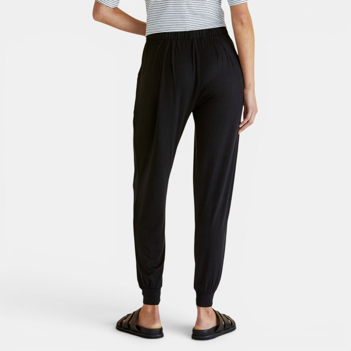 Black Betty Basics Paris Jogger Pants, casual trousers with a relaxed fit, shown on a model with pockets and elastic waistband.