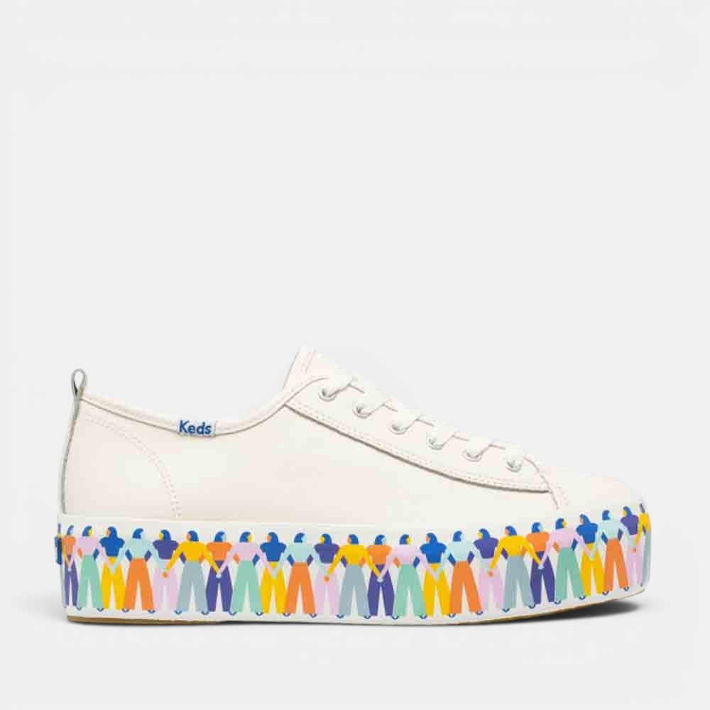 KEDS Triple Up Rainbow People sneakers featuring colorful rainbow-themed design and white rubber sole on a plain background.