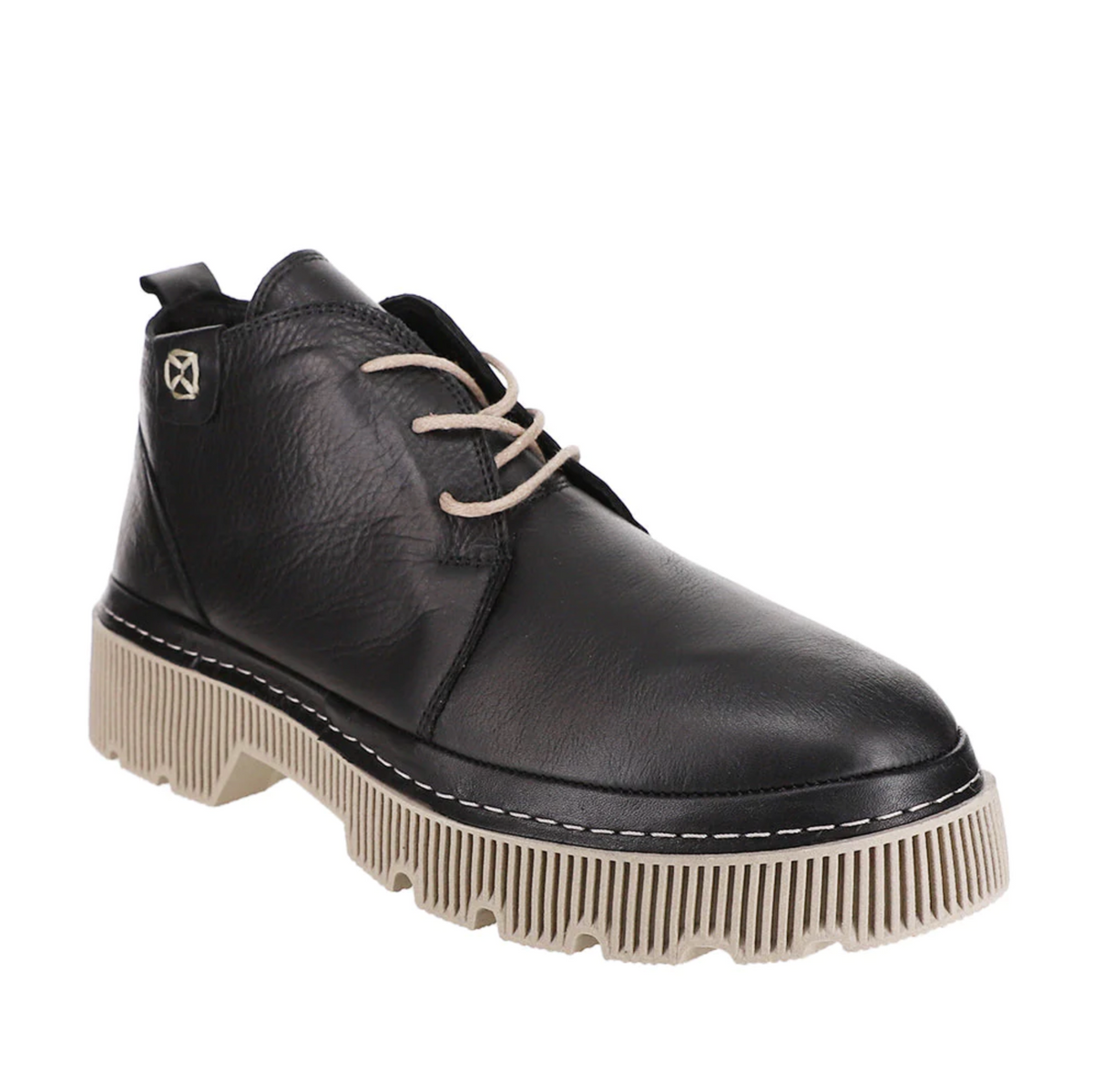 Black Le Sansa Lesansa Raffa boots with sleek design and pointed toe, shown on a model in a side view.