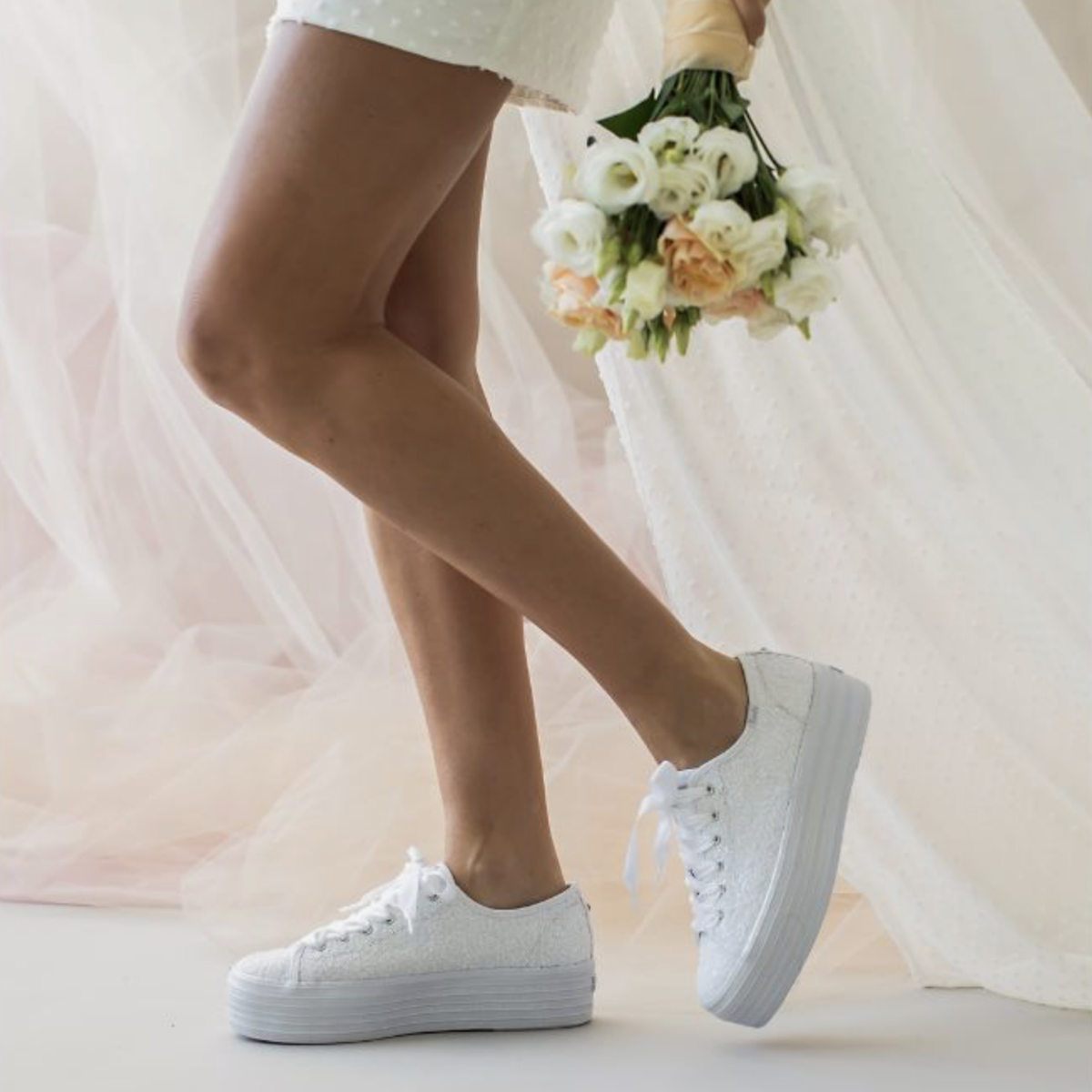KEDS Triple Up Sequin CEL White sneakers with shimmering sequin details and white rubber soles.