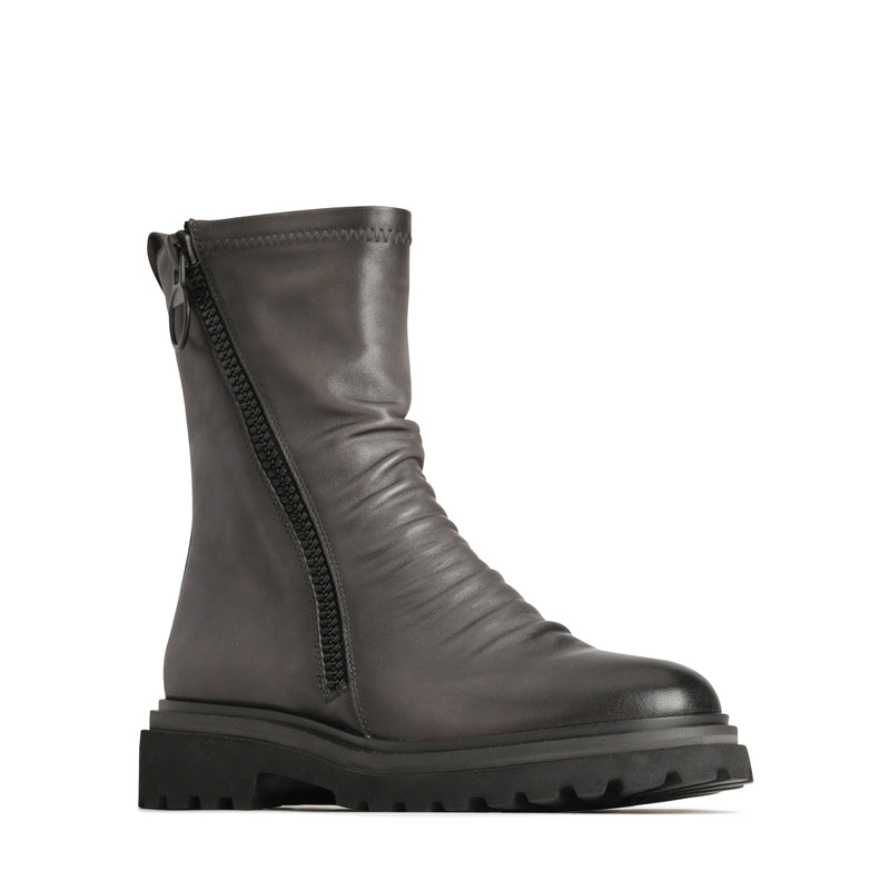 Eos Skarlet Iron ankle boots in black leather with chunky heel and lace-up design, stylish footwear from Eos.