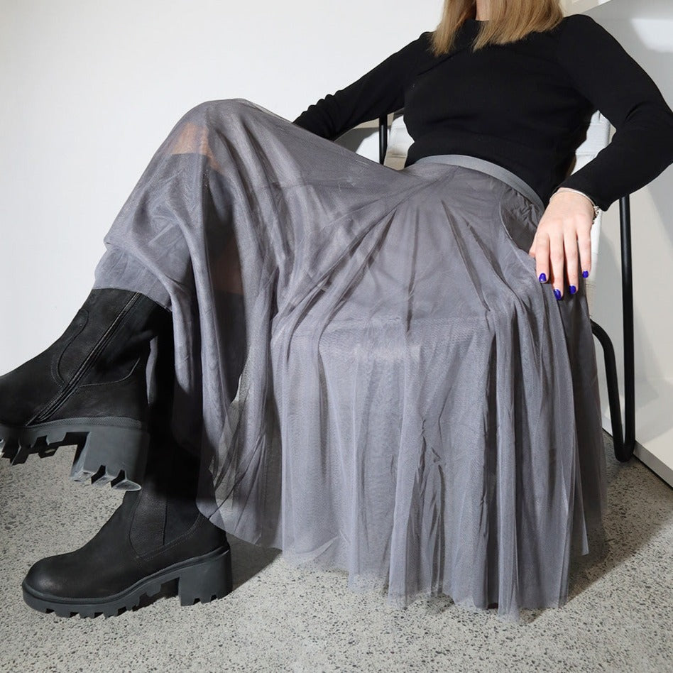 Minx Swan Lake tulle skirt in graphite with layered tulle fabric and a flowing silhouette, displayed on a neutral background.