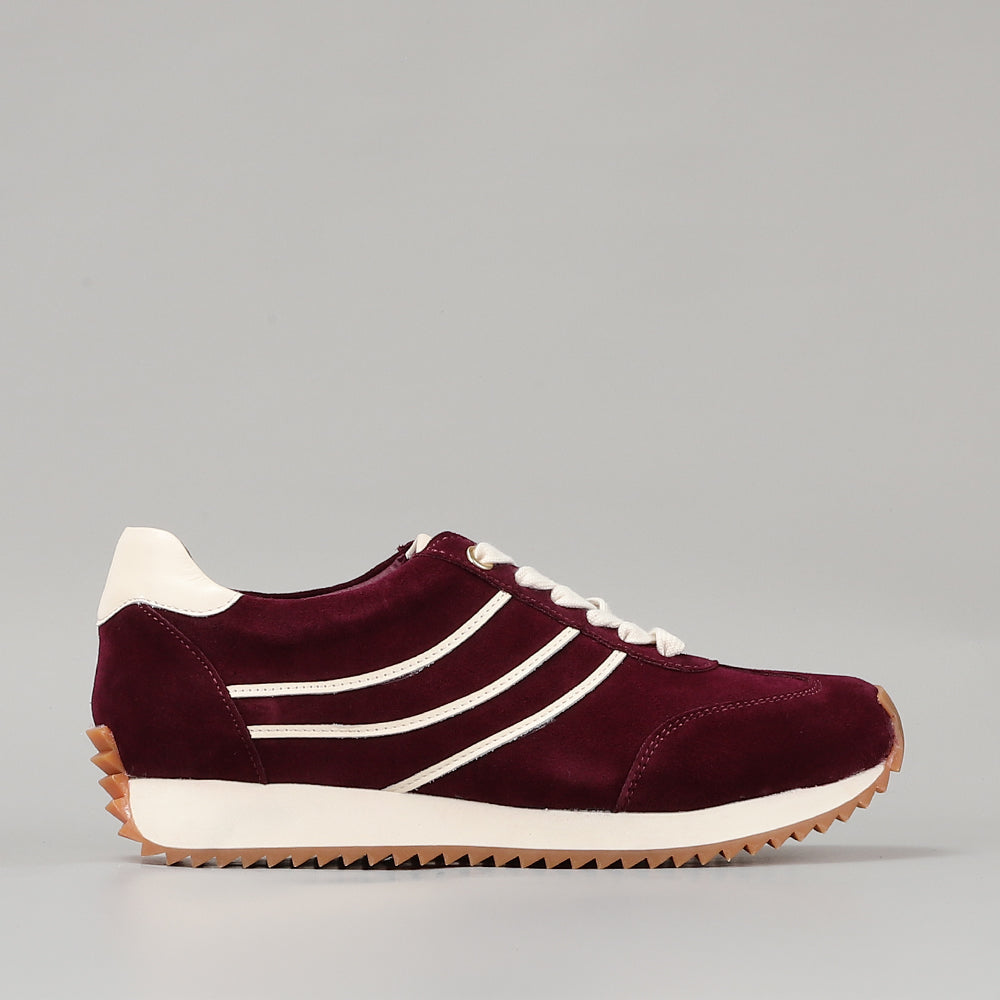 Naked Arches Wednesday Burgundy sneakers with suede and leather accents, featuring a sleek design and white rubber sole.