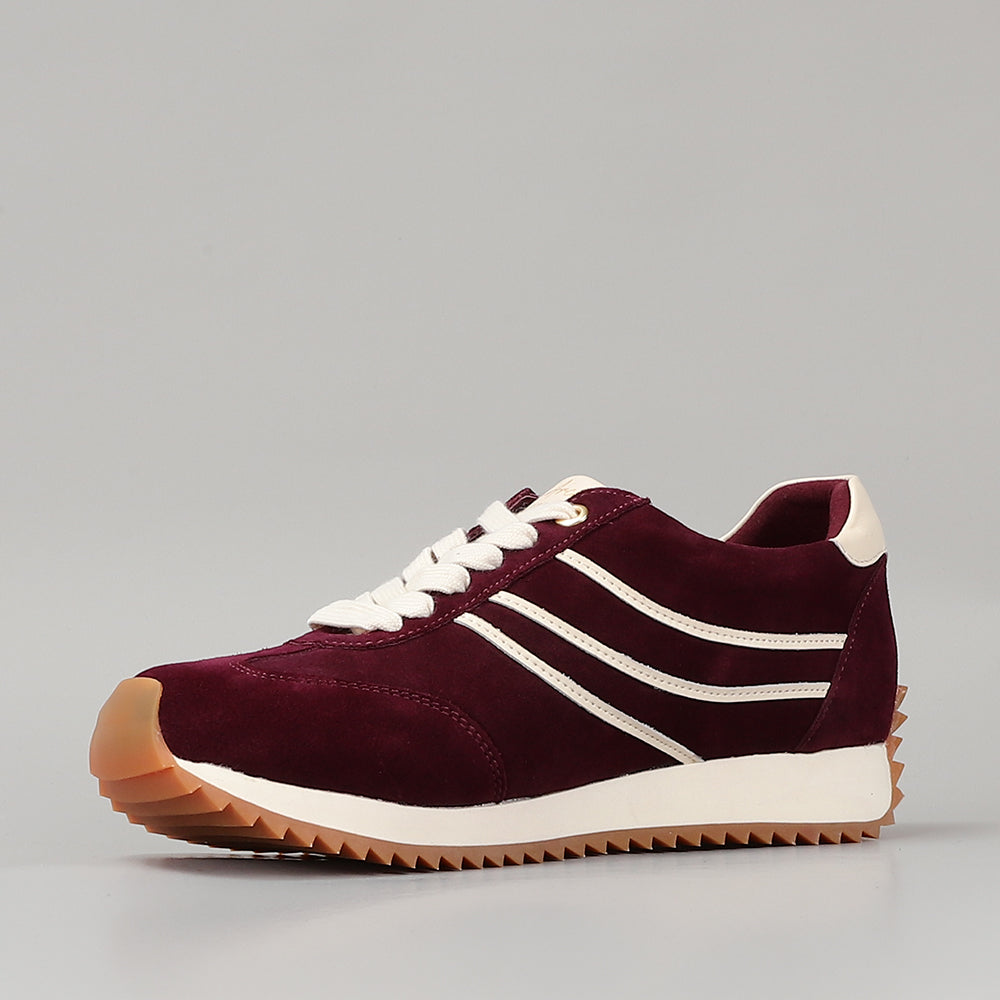 Naked Arches Wednesday Burgundy sneakers with stylish burgundy uppers and white soles, casual slip-on sneaker design.