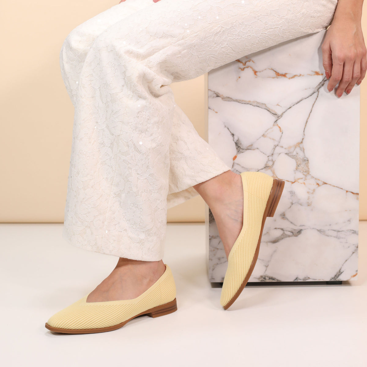 Los Cabos Syra Butter slip-on shoes with a smooth, stylish design and beige color, perfect for casual wear.