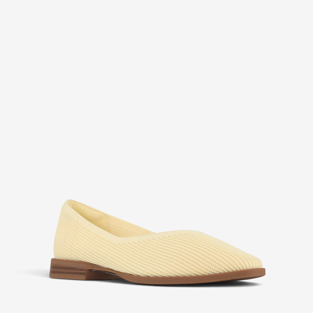 Los Cabos Syra Butter slip-on shoes with beige and brown color, casual design, and comfortable fabric material.