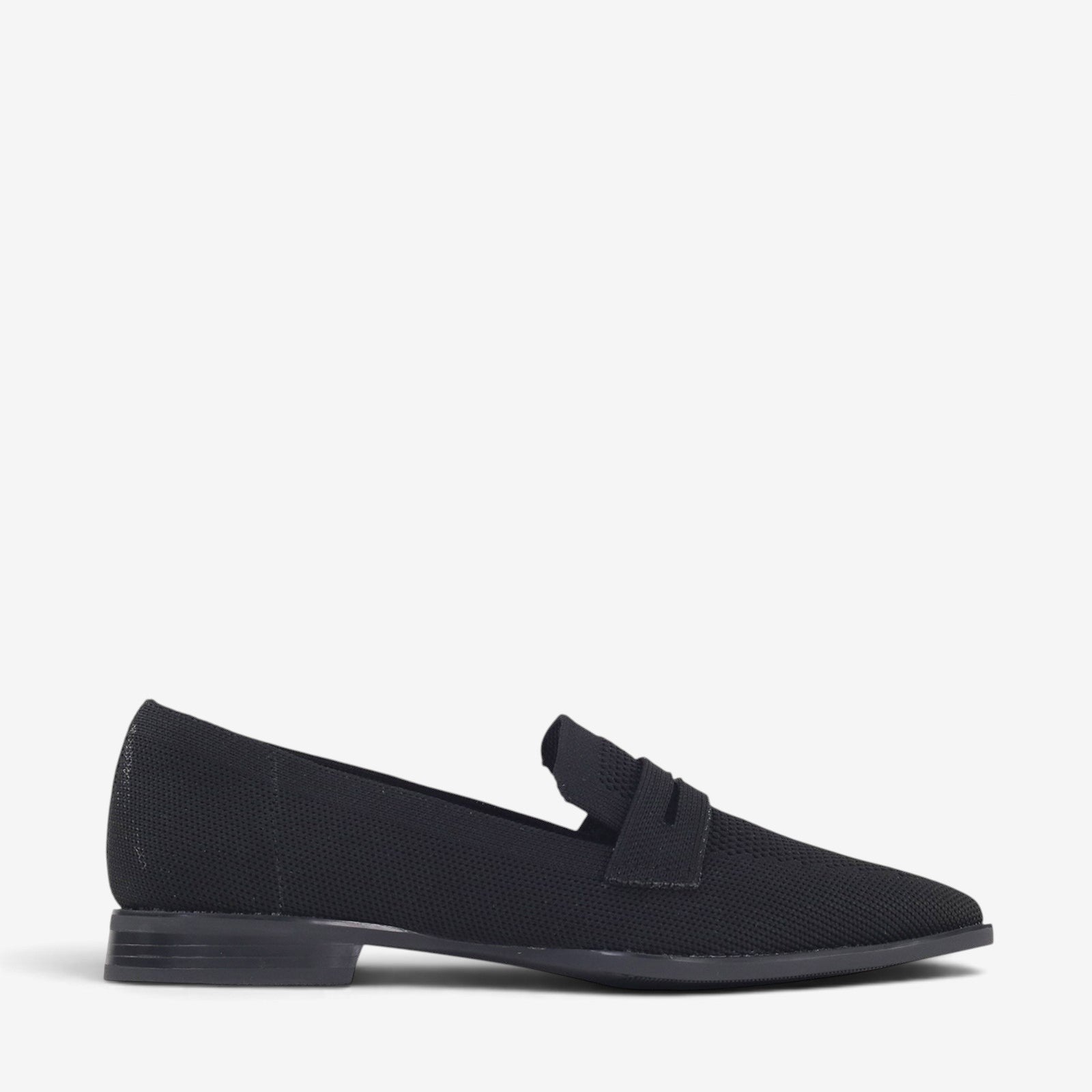 Black Los Cabos Syriana slip-ons with sleek design and comfortable fit, shown on a model's feet.