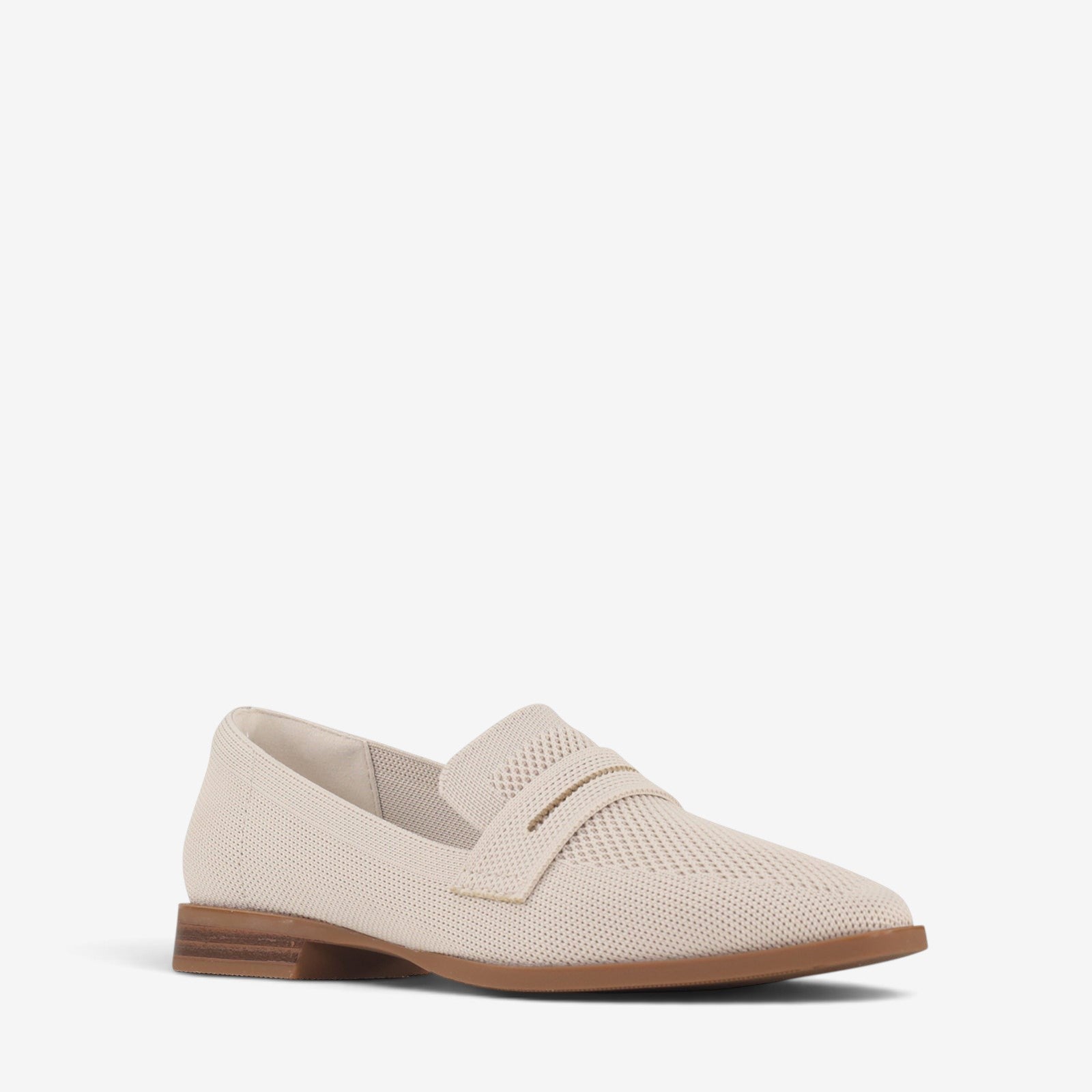 Los Cabos Syriana light taupe slip-on shoes with a sleek, casual design and comfortable fit, shown from the side.