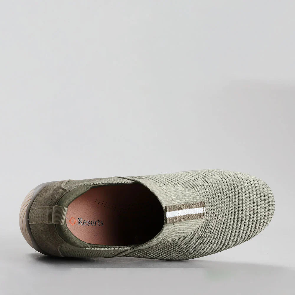 CC Resorts Tabitha Khaki slip-on shoe with a sleek, casual design and khaki-colored fabric upper.