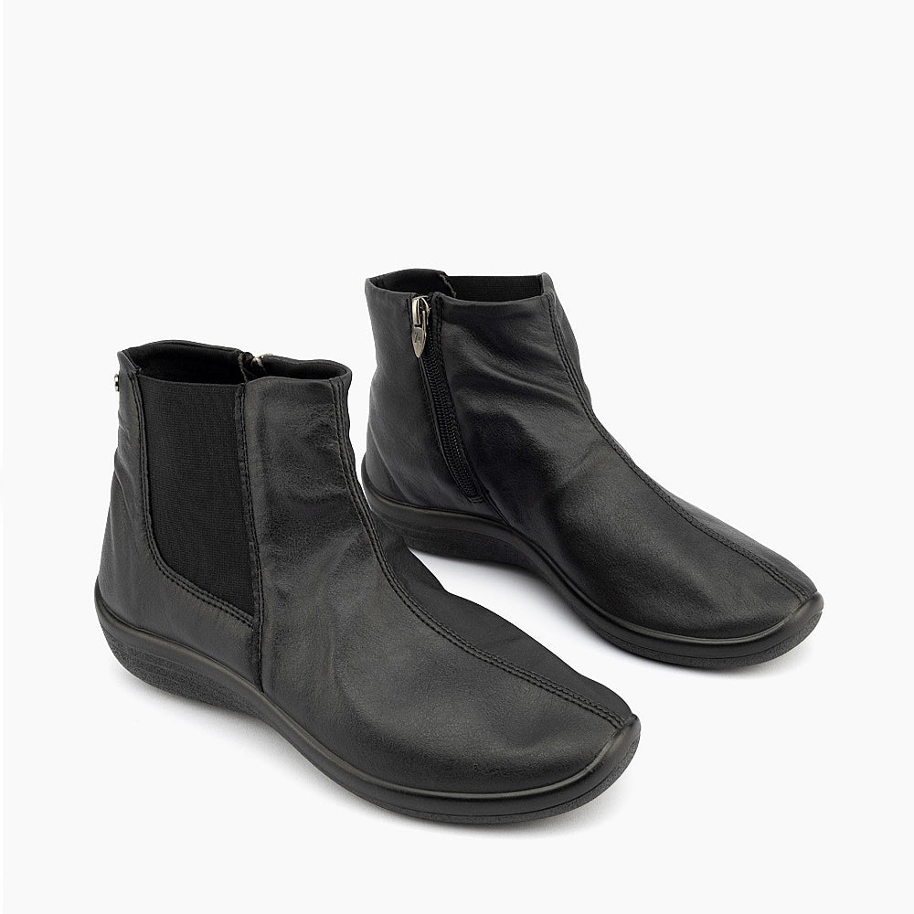 Black Arcopedico Trakai boots with a sleek, modern design and comfortable fit, featuring smooth leather and stylish ankle length.