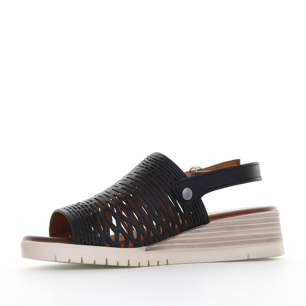 Black Le Sansa Sansa Topaz sandals with open toe design and stylish straps, perfect for summer footwear.