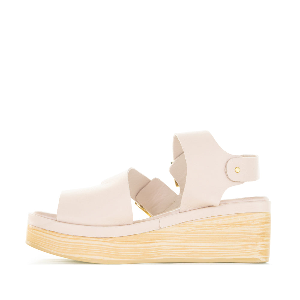 Le Sansa LESANSA TRI CAMEO sandals featuring beige straps and a flat sole, displayed on a white background.