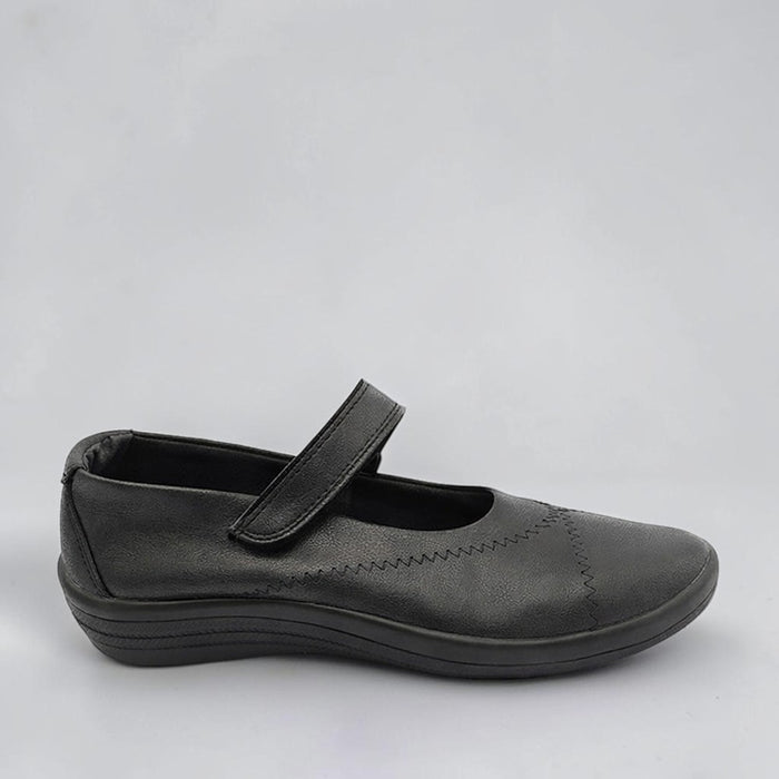 Black Arcopedico Triglav Mary Jane shoe with rounded toe and adjustable strap, showcasing comfortable, stylish footwear.